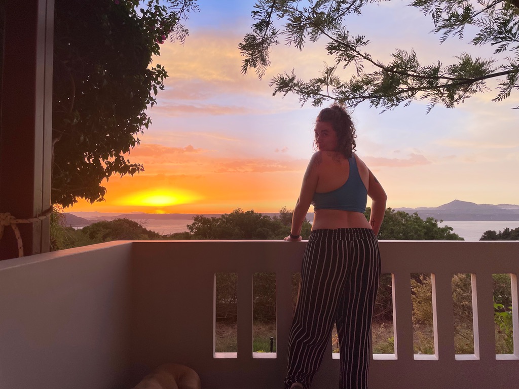 Me on my porch with the sunset in the background