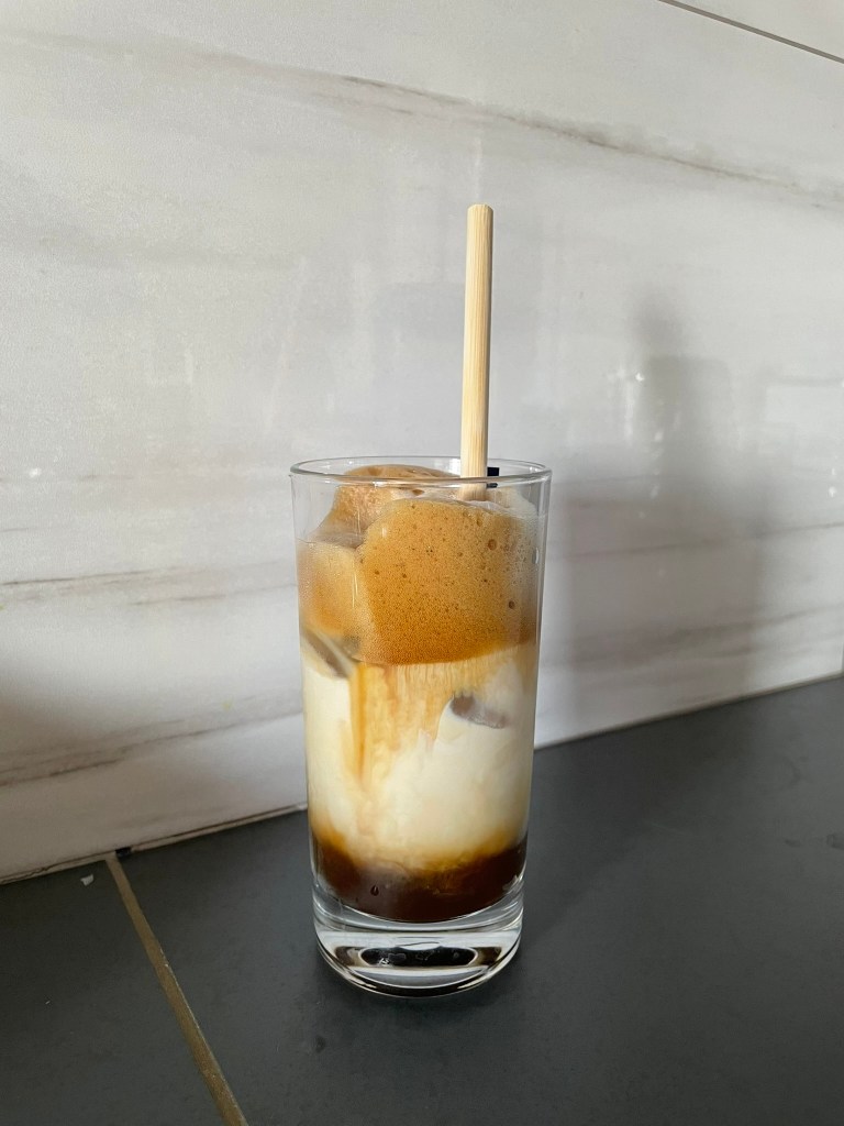 Cold frothy coffee drink