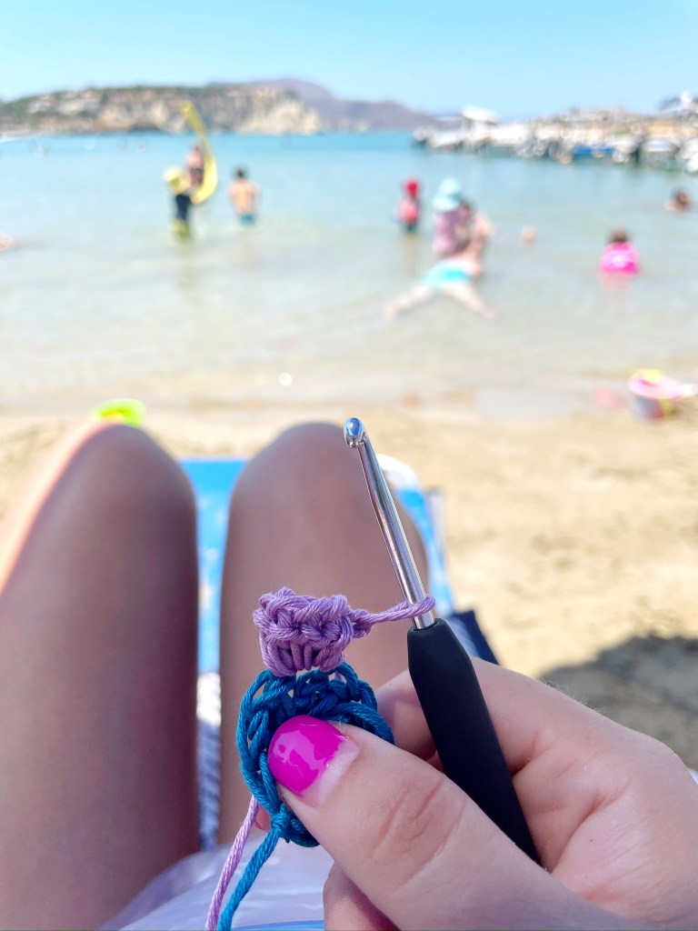 My crocheting on the beach in Almyrida