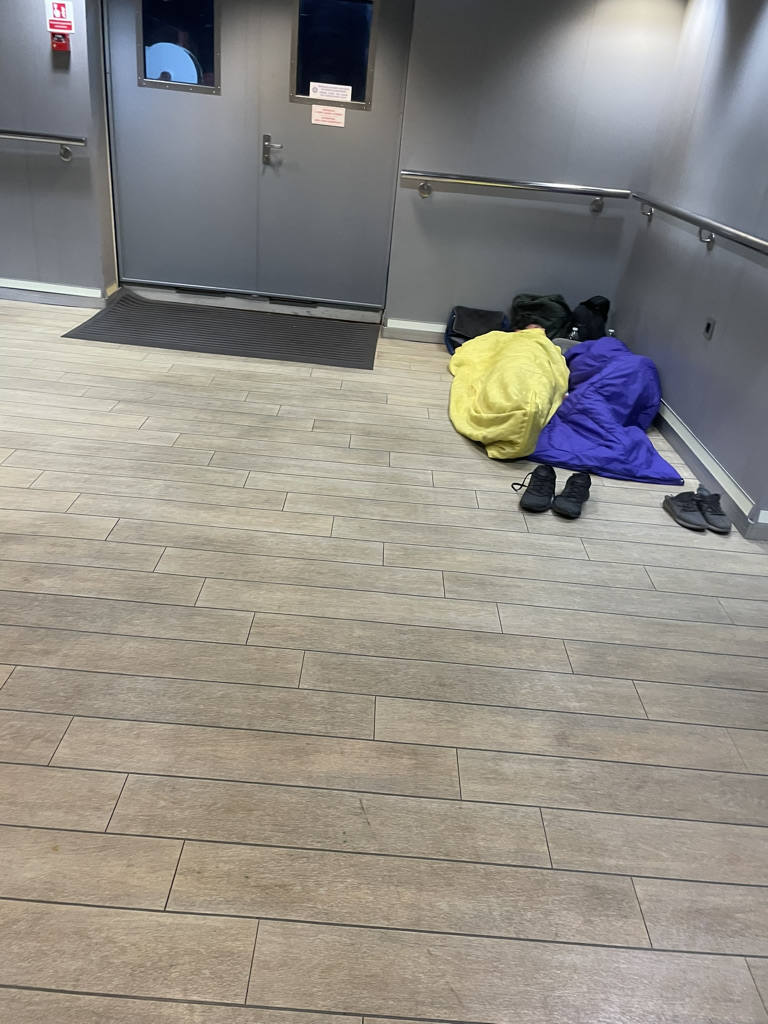 People sleeping on the floor of the ferry boat